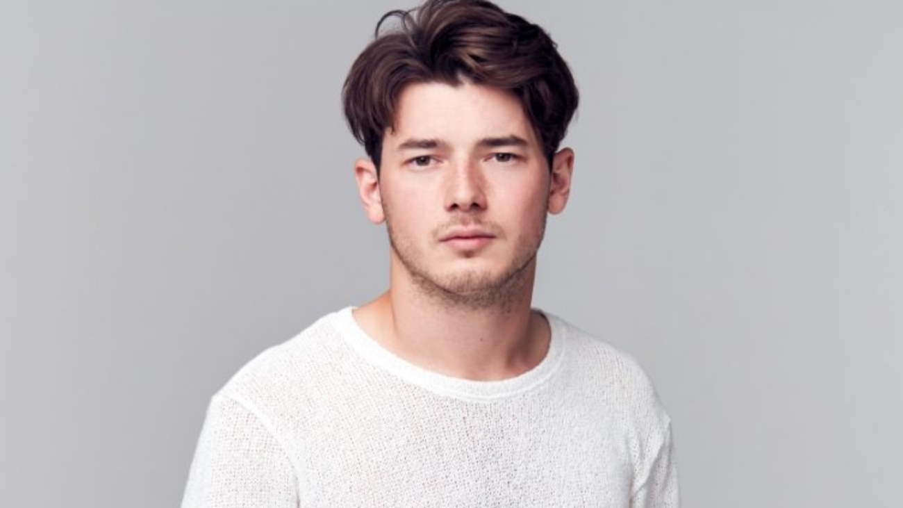 Demo attachment 1568 studio portrait of young man with serious 8YSPPQM